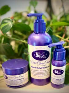 Three purple containers of Veta Green Cream - 45g pump, 100g jar and 250g pump. Natural Herbal Skincare